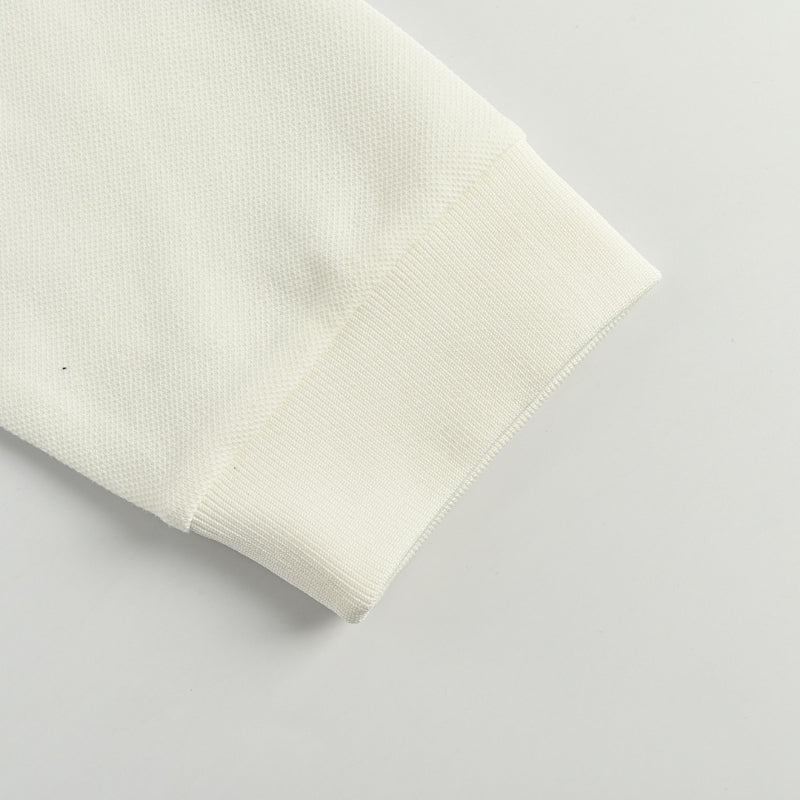 Gucci Ivory Long-Sleeve Polo with Collegiate Crest Graphic and Contrast Shoulder