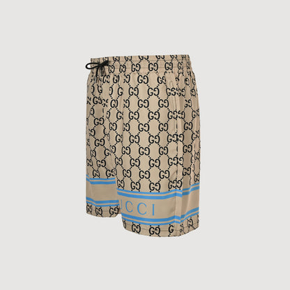 Gucci All-Over Dual-Letter Jacquard Swim Shorts – Sand / Blue Stripe Hem