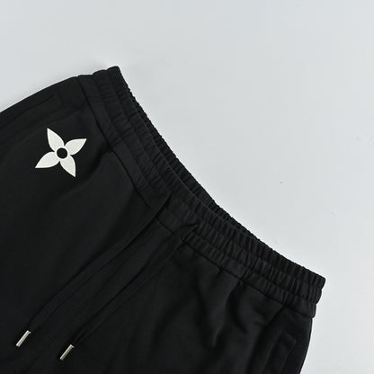 Louis Vuitton Scattered Monogram Graphic Joggers — Black