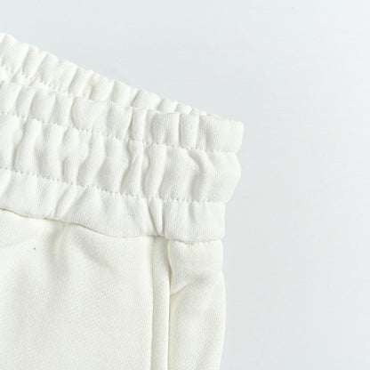 Louis Vuitton Signature Script Embroidered Shorts — Cream