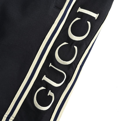 Gucci Side Script Fleece Shorts – Black / Cream Stripe
