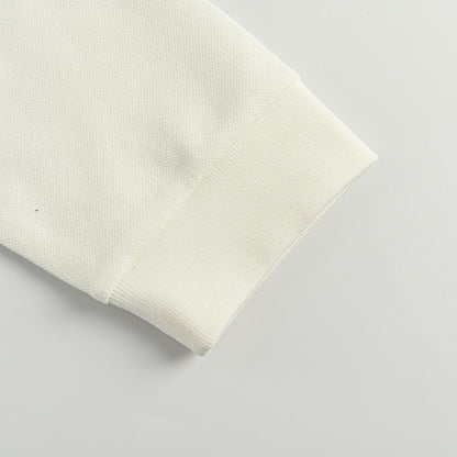 Gucci Ivory Long-Sleeve Polo with Collegiate Crest Graphic and Contrast Shoulder