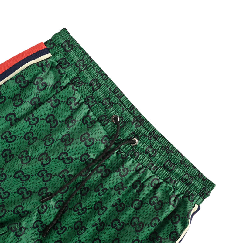 Gucci All-Over Dual-Letter Jacquard Swim Shorts – Green / Side Stripe