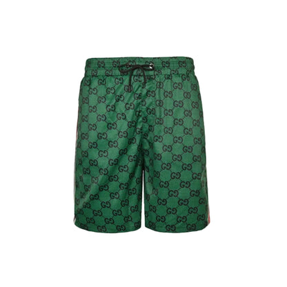 Gucci All-Over Dual-Letter Jacquard Swim Shorts – Green / Side Stripe